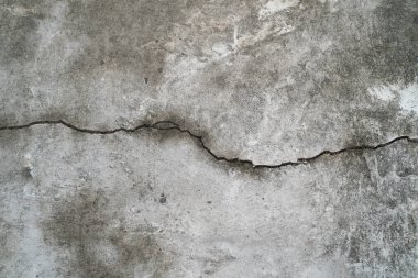 Çatlak çimento hasarı duvar dokusu arka planı.