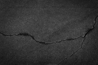 Kırık asfalt üst görünümünün arkaplan dokusu
