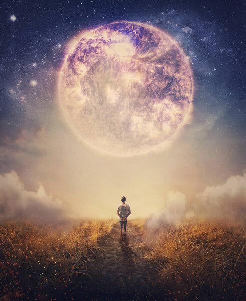 Dreamy scene with a person walking a pathway with the view to the fantastic cosmic sky. Surreal scene of adventure concept. Following a magical nebula