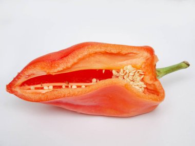 sliced red pepper on a light background, close-up, sweet red bell pepper,