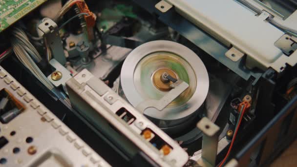 Video cassette is loaded in the VCR, Magnetic videotape in the VCR mechanism. — Video Stock