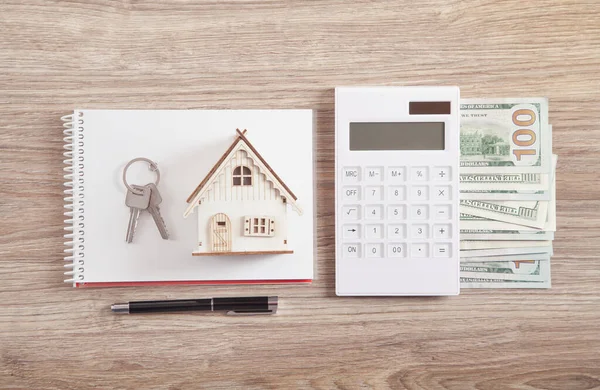 Wooden House Model Keys Calculator Money Pen Notepad — Stock Photo, Image