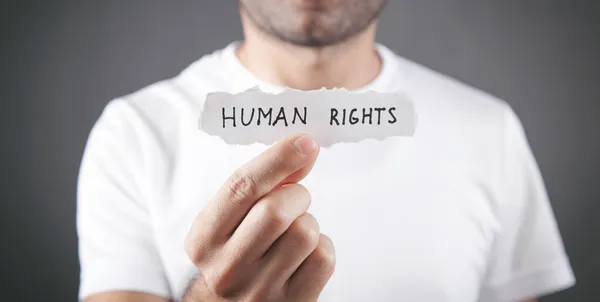 Man Showing Human Rights Text Torn Paper — Stock Photo, Image