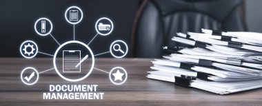 Masada yığınla belge var. Belge Yönetimi