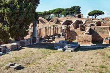 City skyline and ancient Roman buildings architecture at archaeological excavation n Ostia antica, a beautiful travel destination with well preserved ruins, Rome Italy