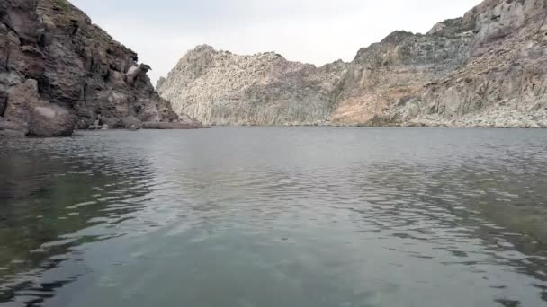 Sea Water Moved Wind Rocky Bay Protected Huge Cliffs Overlooking — Vídeo de stock