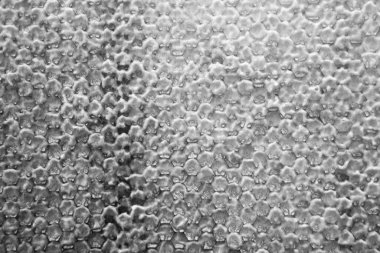 Altın nektarla dolu altıgen bal peteklerinden arı damlayan bal damlası, bal peteği yaz kompozisyonu doğal bal damlası, balmumu çerçeve arısına damlayan bal damlası, bal peteğine damlayan bal damlası