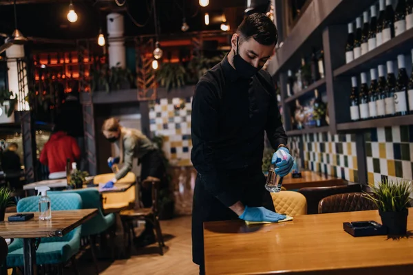 Young Restaurant Waiters Cleaning Disinfecting Tables Surfaces Coronavirus Pandemic Disease — 스톡 사진