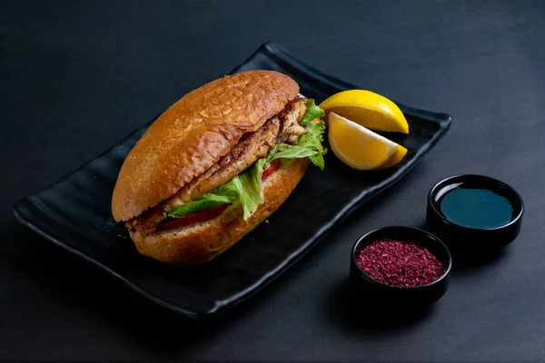 Breaded Fish Crispy Sandwich with pomegranate Sauce