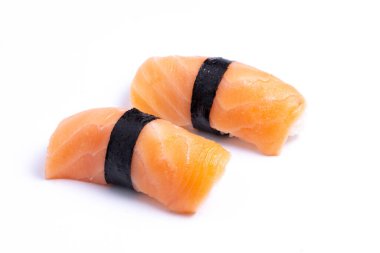 Salmon sushi nigiri isolated on white background. Japanese cuisine