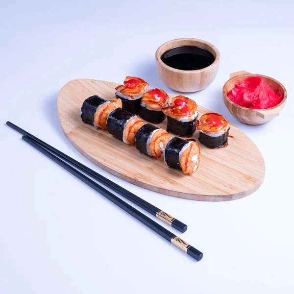 shrimp nigiri and sauce sushi on white background. Close Up of delicious japanese food with sushi roll.