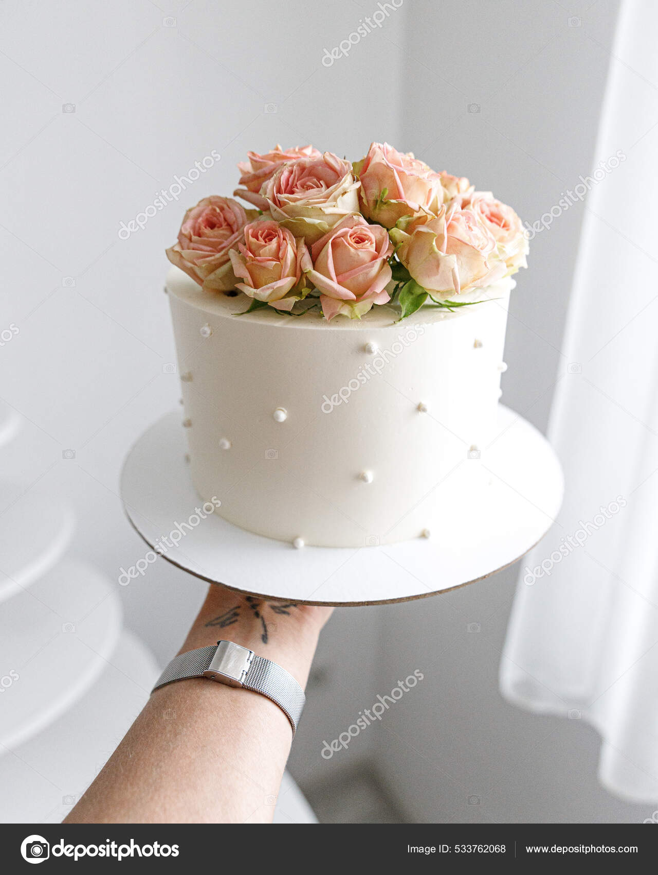 White Cake Pink Flowers Rose Wedding Hold on Hand Stock Photo by ...