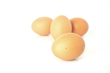 Fresh eggs are isolated on white background. Chicken eggs are rich in protein, vitamins, and essential minerals that are beneficial to the body.