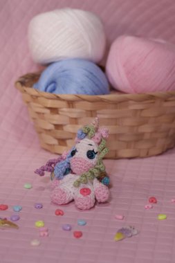 Fluffy amigurumi unicorn plush