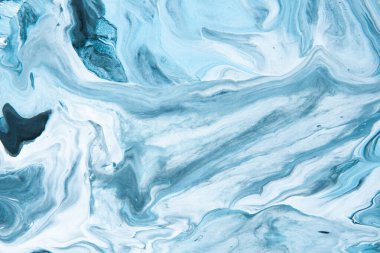 Painting on canvas. Modern art. Mixing paints. Fluid Art. Creative abstract hand painted background