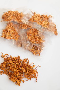 Using cordycepin. militaris mushroom. Dry cordyceps. Fungi for Human Health. Militaris mushroom. Dry cordyceps. Dry Fresh Cordyceps in vacuum packing. Treatment with Adenosine. Dry Fresh Cordyceps.