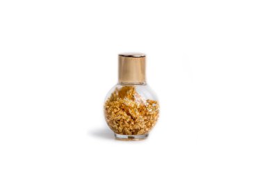 Altın tanecikli yuvarlak cam şişe küçük altın rengi kaplama.