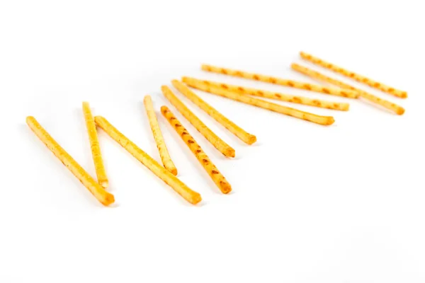 Verspreid Geel Maïs Snack Sticks Zijaanzicht Geïsoleerd Wit — Stockfoto