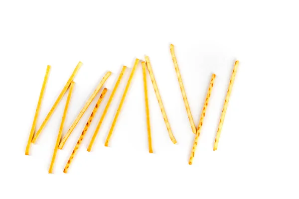 Scattered Yellow Corn Snack Sticks Top View Isolated White — Stock Photo, Image