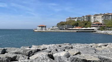 Moda,istanbul,Turkey.May 8,2022.Moda beach and historical Moda pier in the Sea of Marmara