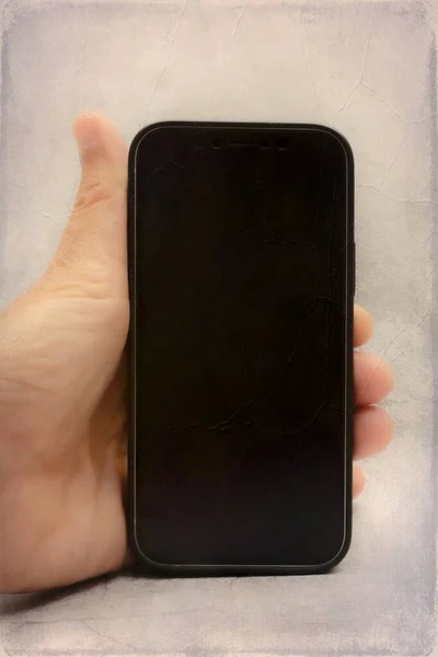 通信和技术用灰色背景手持手机 — 图库照片