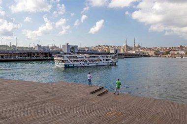 Persembepazari,Karakoy,istanbul,Turkey.July 13,2022.Karakoy Persembe Pazari coastline. Halic and istanbul old city view from the coastline with its historical and modern structures.