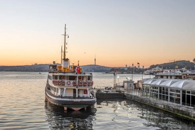 istanbul,Turkey.July 27,2022. The symbol of sea transportation in Istanbul. City lines ferry. The ferry at Eminonu pier early in the morning.