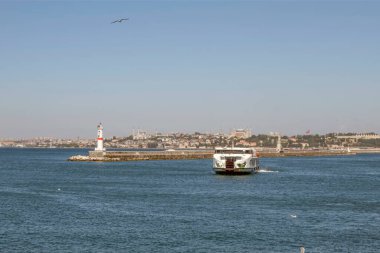 Bosporus,istanbul,Turkey.July 29,2022.The magnificent view of the Bosphorus with the city lines ferry, the symbol of sea transportation in Istanbul, in summer.