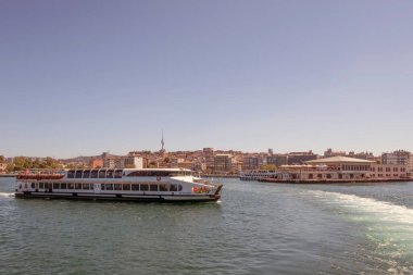 Bosporus,istanbul,Turkey.July 29,2022.The magnificent view of the Bosphorus with the city lines ferry, the symbol of sea transportation in Istanbul, in summer.