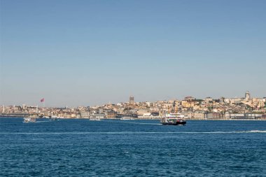 Bosporus,istanbul,Turkey.July 29,2022.The magnificent view of the Bosphorus with the city lines ferry, the symbol of sea transportation in Istanbul, in summer.