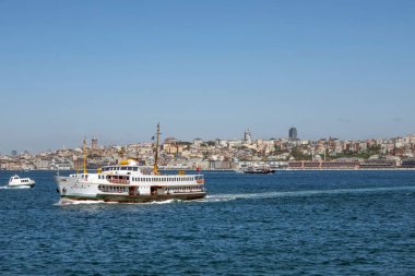 Bosporus,istanbul,Turkey.July 29,2022.The magnificent view of the Bosphorus with the city lines ferry, the symbol of sea transportation in Istanbul, in summer.