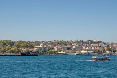 Bosporus,istanbul,Turkey.July 29,2022.The magnificent view of the Bosphorus with the city lines ferry, the symbol of sea transportation in Istanbul, in summer.