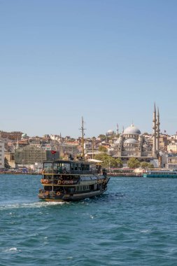 Bosporus,istanbul,Turkey.July 29,2022.The magnificent view of the Bosphorus with the city lines ferry, the symbol of sea transportation in Istanbul, in summer.