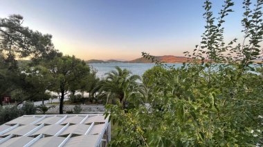 Ayvalik,Balikesir,Turkey.August 11,2022.Ivy Sailing Resort Hotel, located on the Seytan Sofrasi road of Ayvalik district, has a bird's eye view of Ayvalik Bay, Ayvalik Islands and Cunda Island. Holiday and summer view from the hotel.