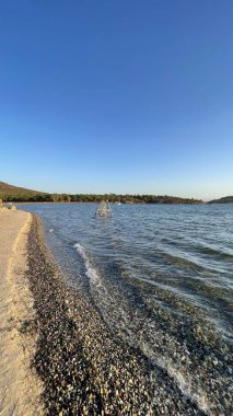Ayvalik,Balikesir,Turkey.August 11,2022.Ivy Sailing Resort Hotel, located on the Seytan Sofrasi road of Ayvalik district, has a bird's eye view of Ayvalik Bay, Ayvalik Islands and Cunda Island. Holiday and summer view from the hotel.