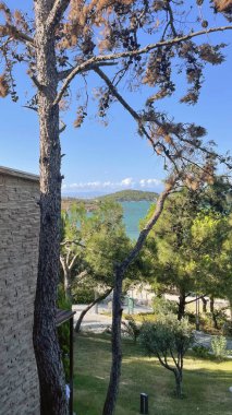 Ayvalik,Balikesir,Turkey.August 11,2022.Ivy Sailing Resort Hotel, located on the Seytan Sofrasi road of Ayvalik district, has a bird's eye view of Ayvalik Bay, Ayvalik Islands and Cunda Island. Holiday and summer view from the hotel.