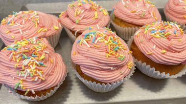 delicious ready-to-eat fruity cupcakes on plate