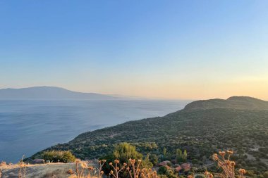 Assos,Turkey.August 12,2022.Summer vacation and Aegean sea view from Assos, located across the island of Lesbos