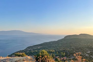 Assos,Turkey.August 12,2022.Summer vacation and Aegean sea view from Assos, located across the island of Lesbos