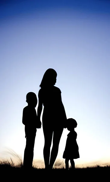 Silhouette Parents Enfants — Image vectorielle