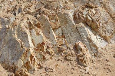 Dünyadaki farklı kaya oluşumları, kaya çeşitleri, sarı kayalar.,