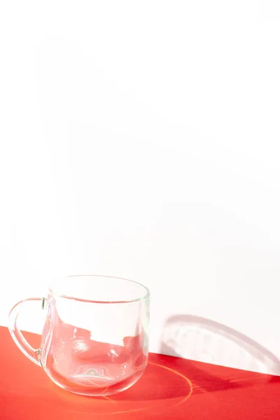 Transparent Glass Cup Red Table White Background Isometric Projection Copy — Stock Photo, Image