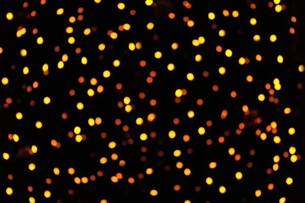 Navidad Luces Bokeh Borrosas Doradas Sobre Fondo Negro Luces Brillante —  Fotos de Stock