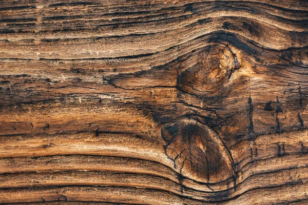 Eski ahşap kahverengi arka plan. Doku doğal koyu grange desenli. Yapısal dalgalı çizgiler. Uzayı metin için kopyala. Yumuşak Seçili Odak