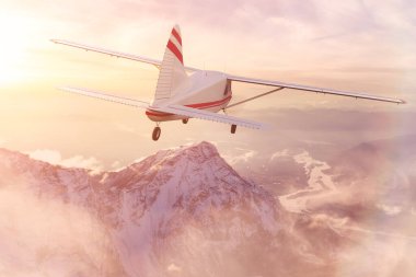 Tek motorlu uçak Rocky Dağı üzerinde uçuyor..