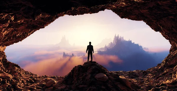 Dramatischer Blick auf den abenteuerlustigen Mann, der in einer Felshöhle steht. Berglandschaft — Stockfoto