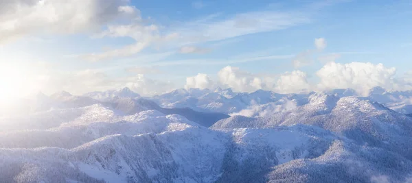 Aerial Panoramic View of Canadian Mountain covered in snow. — Fotografia de Stock