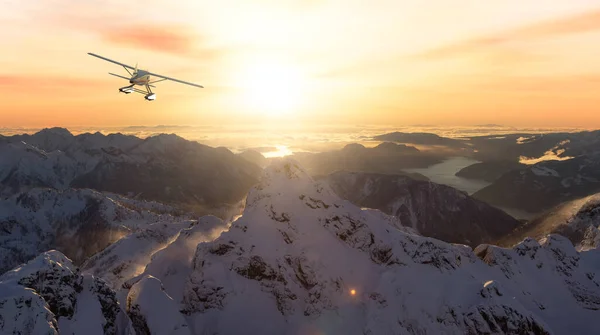 Seaplane Flying over the Rocky Mountain Landscape. Adventure Composite — 스톡 사진