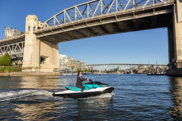 Adventurous Caucasian Woman Water Scooter Riding Ocean Sunny Sunset Sky — Fotografia de Stock