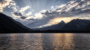 Lake, trees and mountains in Canadian Landscape. Chilliwack Lake, British Columbia, Canada. Nature Background. Panorama